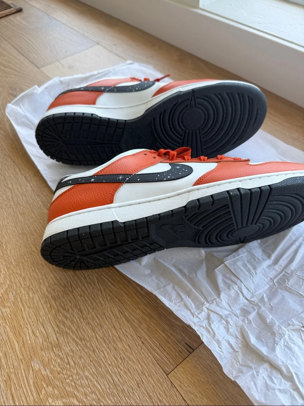 Nike Dunk Low-Top Sneakers in White, Orange & Black.